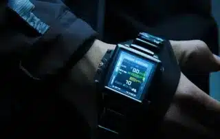 a person wearing a high-tech device on their wrist for work safety monitoring.